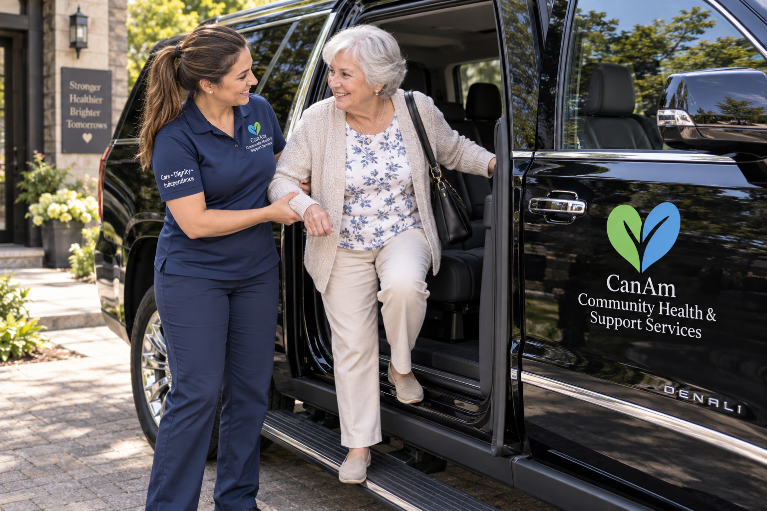 A caregiver assisting an older adult beside a passenger vehicle